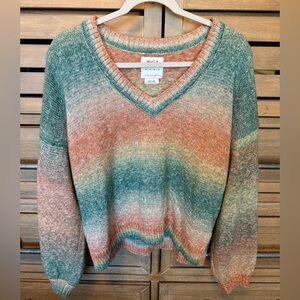 Like new RVCA v neck sweater size medium